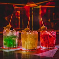 The signature green, yellow and red negronis.