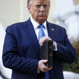 US President Donald Trump with a Bible at St John's Park in Washington DC on Monday.
