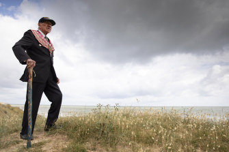 D-Day veteran Charles Norman Shay is one of relatively few Americans in France to mark D-Day this year. He is pictured here on the dune overlooking Omaha Beach in Normandy.