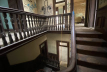 The main central staircase inside Home at Kangaroo Point appears in reasonably good condition, despite 119 years of use.