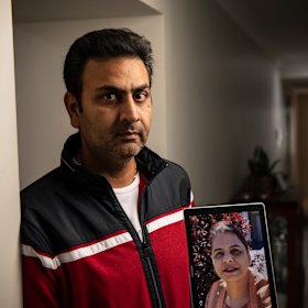 Baljit Khare with a photo of his wife.