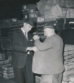 Police raid Victoria Market in the 1960s.