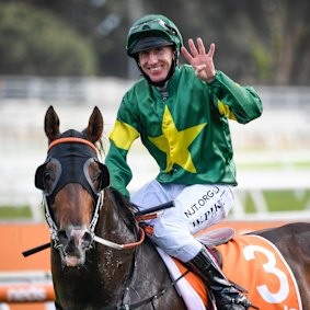 William Pike return on Ole Kirk after winning the Caulfield Guineas