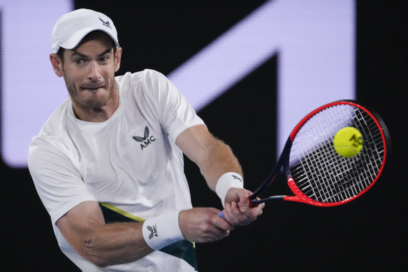 Andy Murray plays a backhand return to Thanasi Kokkinakis.