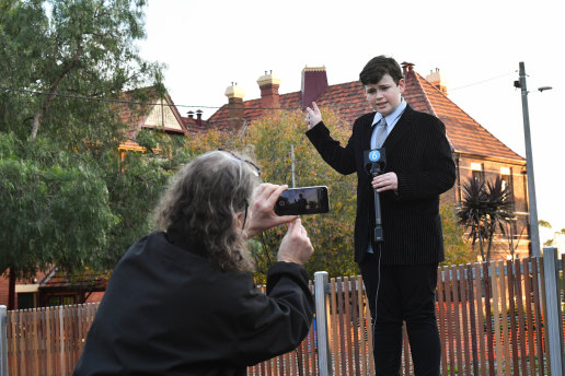 Got the shot? Leonardo Puglisi, 12, filmed by father Bendedict indicates the turret that held the bell tower, at West Hawthorn Primary school.