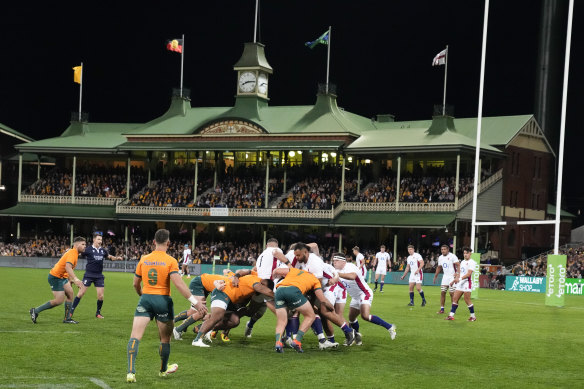 The Wallabies and England do battle in front of the SCG’s historic member’s stand.