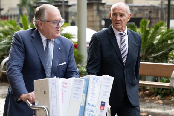 Chris Dawson, right, pictured in the New South Wales Supreme Court last year.