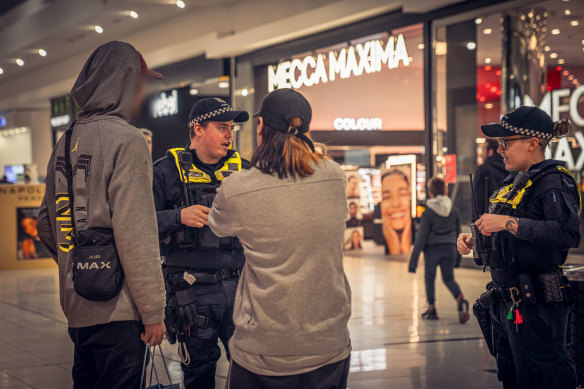 Police blitz a shopping centre as part of Operation Alliance.