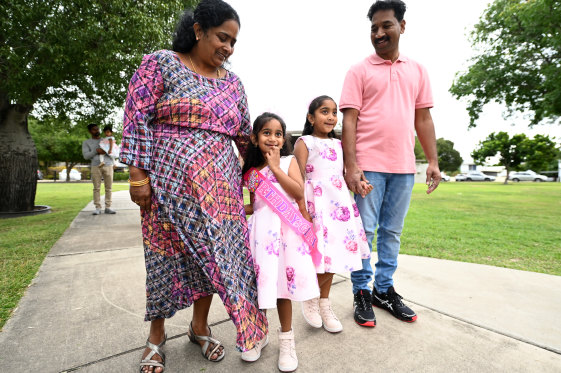 Tharnicaa Nadesalingam (2nd left) arrives for her fifth birthday party with her parents Priya and Nades and sister Kopika after their safe return to Biloela.