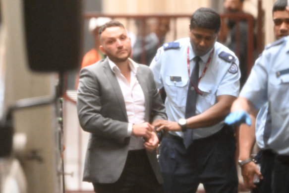 Abdullah El Nasher (left) arrives at the Supreme Court.