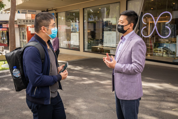 Alan Qu (right), taking about the election in the Chisolm Electorate.