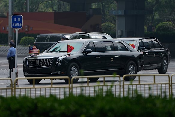 Twin Beasts: Trump returns to his hotel after meeting Xi on Thursday.