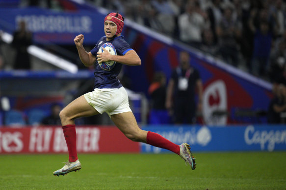 Louis Bielle-Biarrey runs in one of France’s 14 tries in front of a raucous Marseille crowd.