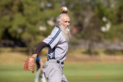 Freeman pitches at the club’s centenary heritage day at Ross Straw Field in Parkville.