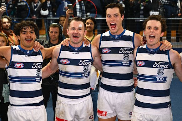 Lawson Humphries, Patrick Dangerfield, Shannon Neale and Max Holmes of the Cats sing the song.