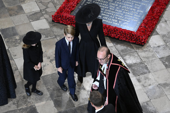 Catherine, Princess of Wales, Princess Charlotte of Wales and Prince George of Wales arrive at Westminster Abbey for The State Funeral of Queen Elizabeth II.