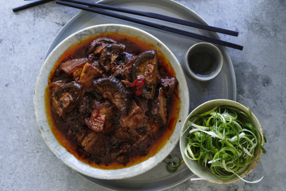 Braised pork belly with black beans and shiitake mushrooms.