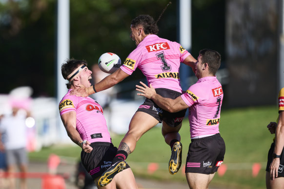 The Panthers celebrate a try by hooker Luke Sommerton (left).