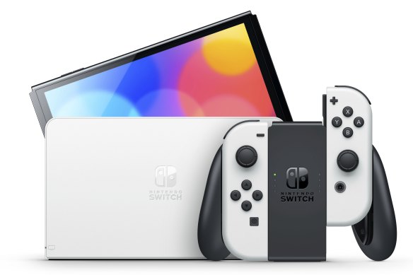 The Nintendo Switch (OLED Model) comes in white instead of grey, but there’s also a red and blue neon version with a black dock.