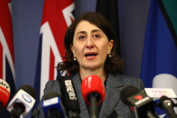 Gladys Berejiklian announcing her resignation to the media last year.