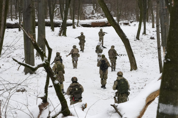 Members of Ukraine’s Territorial Defence Forces, volunteer military units of the Armed Forces, train in a city park in Kyiv, amid fears of a Russian invasion. 