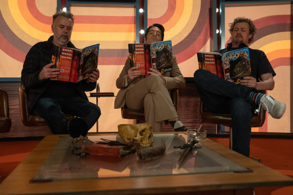 Colin Cairnes (left) with his brother and co-director Cameron (right) with David Dastmalchian on the set of Late Night with the Devil. 