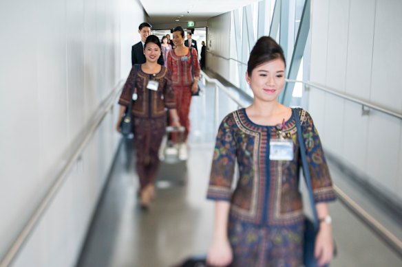 A tripulação da Singapore Airlines: amigável, eficiente e imperturbável. 