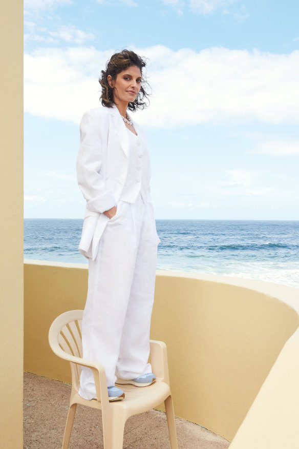 Zoë wears Michael Lo Sordo jacket, vest and pants, from Net-a-Porter. Louise Olsen choker from Dinosaur Designs, New Balance sneakers.