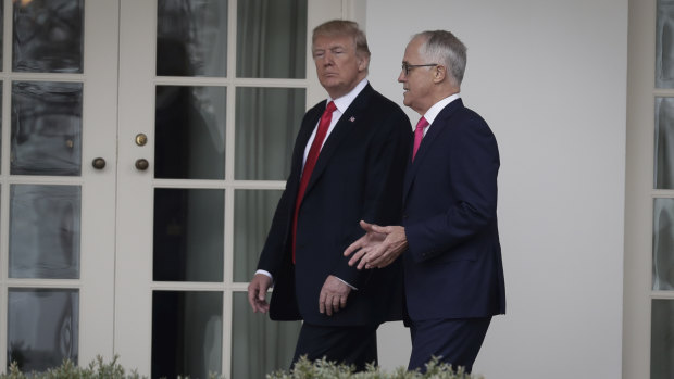 President Donald Trump walked through the White House grounds with Malcolm Turnbull after an honour guard welcome. 