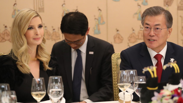 Ivanka Trump and South Korean President Moon Jae-in (right) attend a dinner in South Korea at the same time the US announced tough new sanctions.
