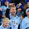 BRISBANE, AUSTRALIA - MAY 28: Blues fans cheer ahead of game one of the Men’s State of Origin series between Queensland Maroons and New South Wales Blues at Suncorp Stadium on May 28, 2025 in Brisbane, Australia. (Photo by Chris Hyde/Getty Images)