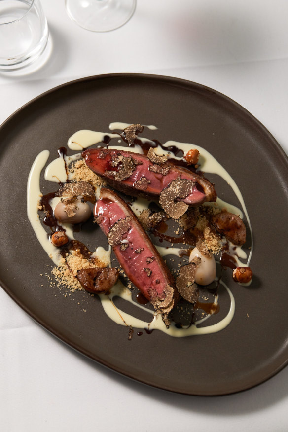 Duck breast with duck sausage and liver parfait.
