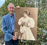 Inspiring life: Dr Bob Brown holding a photo of soprano Amy Sherwin.