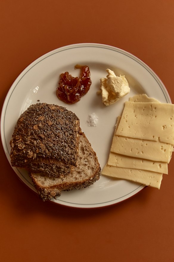 Bread, butter, marmalade and cheese combo.