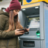 A tourist's girl looks into the purse and sees that she has lost a credit card or she was cheated on money or something else happened that is unpleasant. iStock image for Traveller. Re-use permitted.
