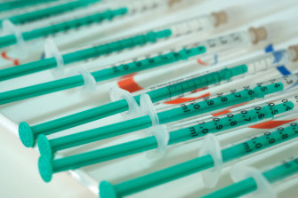 Syringes filled with doses of the AstraZeneca vaccine at a private medical practice in Germany. 