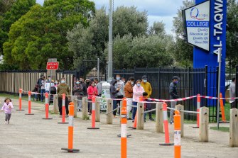 People line up for testing at Al-Taqwa College in Melbourneâs west. 