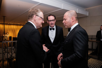 Frydenberg with RBA governor Philip Lowe and Treasury secretary Steven Kennedy. The budget will have an impact on the RBA’s policy direction.