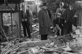 Governor-General Lord Gowrie visits the homes of Mr McEachern in Bellevue Hill that was destroyed during the Japanese attack on Sydney Harbour.