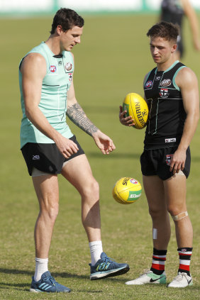 Carlisle (left) with teammate Jack Billings.