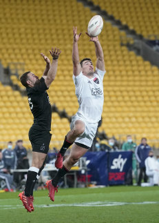 South's Will Jordan, right, leaps to take the ball to score the match winning try during the North vs South rugby game in Wellington, New Zealand, Saturday, Sept. 5, 2020. The All Blacks which will be named Sunday, Sept 6. 