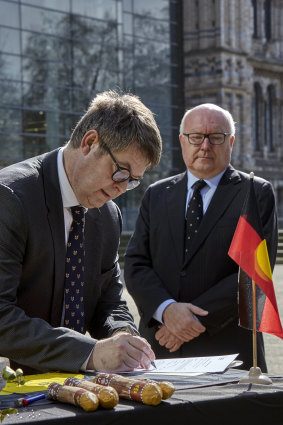 Natural History Museum Director Sir Michael Dixon (left) and Australian High Commissioner to the United Kingdom George Brandis during Tuesday's  repatriation ceremony in London. 