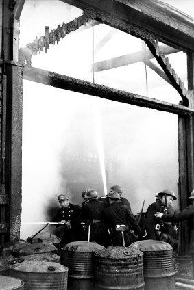 Fighting the fire at number 7 wharf, Cambell's Cove, near Circular Quay. 2nd August 1944