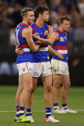 Bailey Dale, Josh Dunkley, and Jack Macrae after their grand final loss to Melbourne.