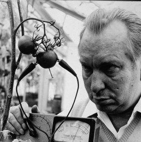 L. Ron Hubbard, founder of Scientology, using an e-meter to determine whether tomatoes suffer pain.