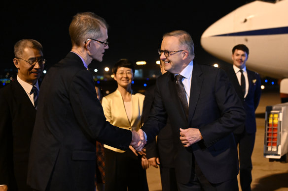 Graham Fletcher, Australia’s ambassador to China, greets Prime Minister Anthony Albanese at Hongqiao Airport, Shanghai.