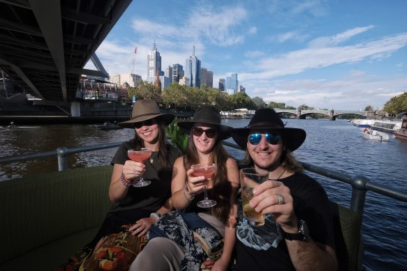 Ireland Hall, Zenya Surgeoner and Aben Drake enjoying a drink at Ponyfish Island on Monday. 