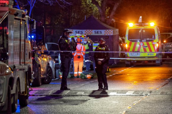 Police and emergency services personnel at the scene of the fatal shooting in Fitzroy on Tuesday evening.