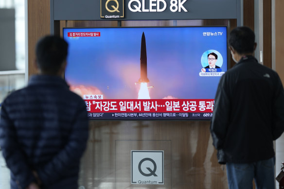 A TV screen showing a news program reporting about North Korea’s missile launch with file image, is seen at the Seoul Railway Station in Seoul, South Korea.