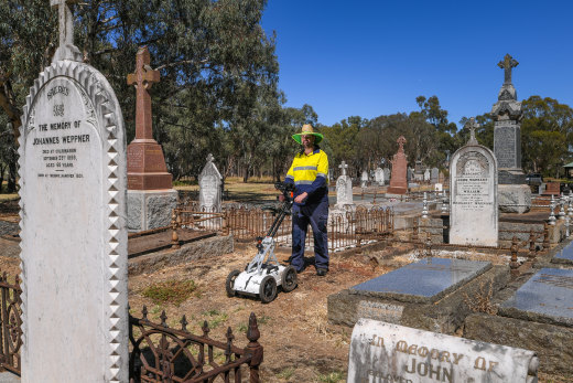 David Hunter, aka Dave the Grave Hunter, looking for vacant graves at Colbinabbin Cemetery.